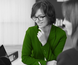 Smiling Simpleworks professional helping a client